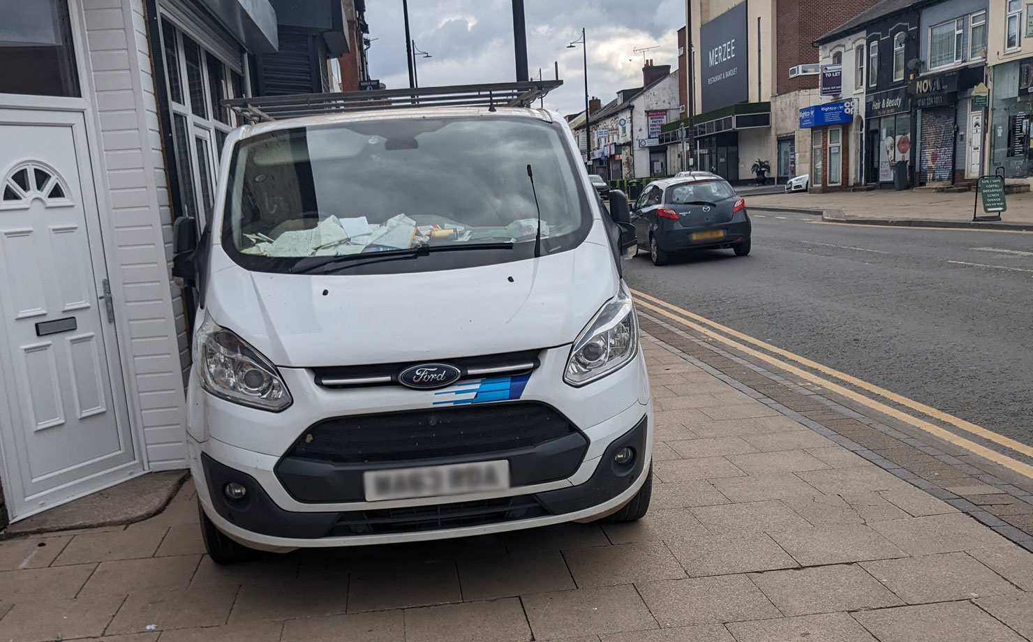 Parked van on pavement